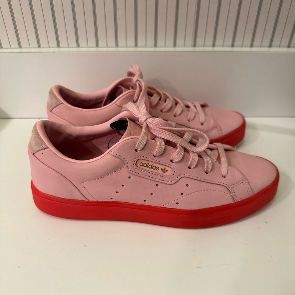 Adidas sleek shoe in pink with hot pink/reddish sole